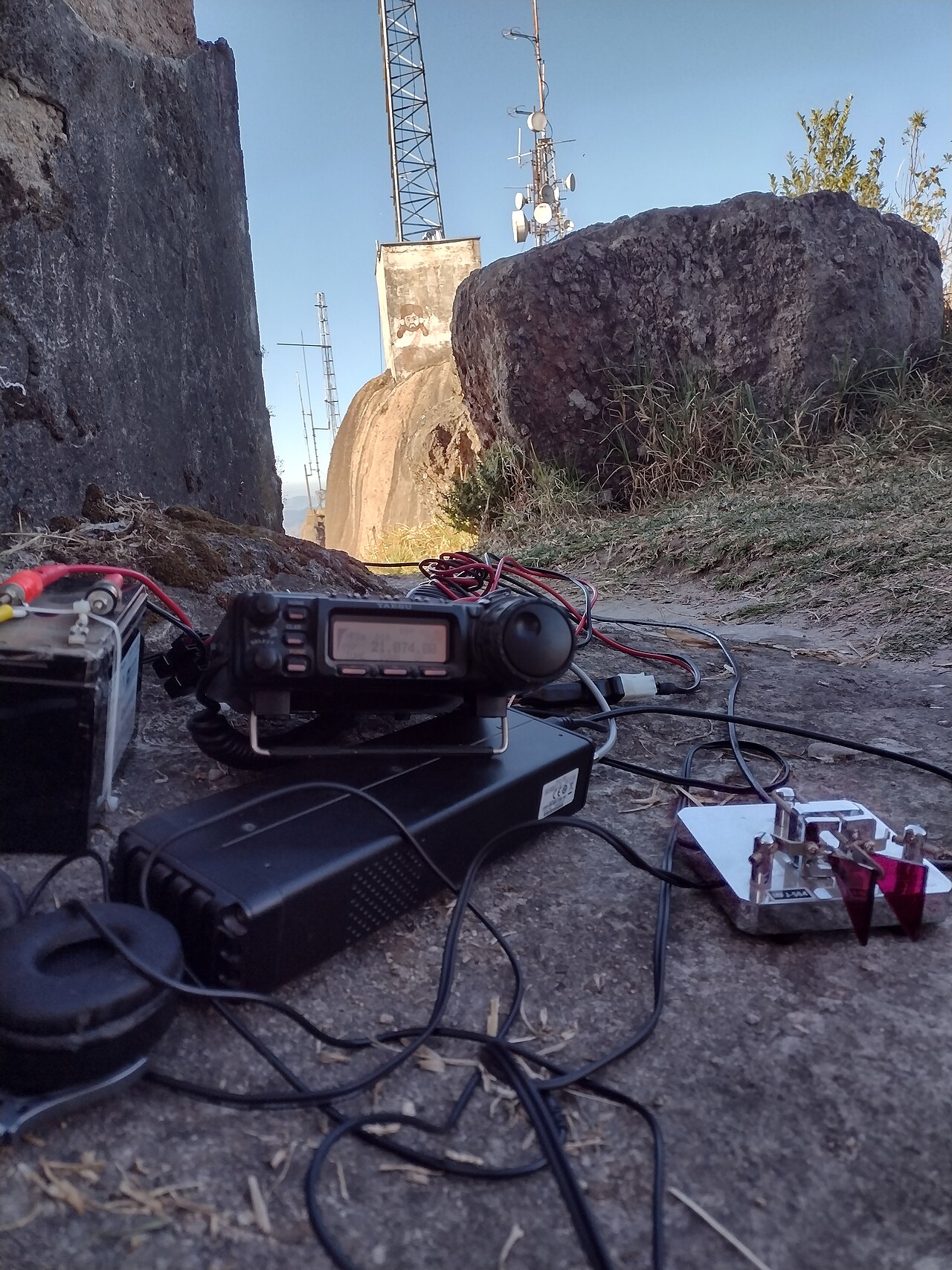 An operator running a portable amateur radio station during a Summits On The Air activation